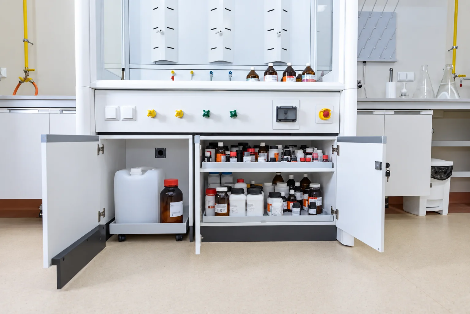 Sanitary and Epidemiological Station in Radom: open cabinet under a fume hood with reagent bottles