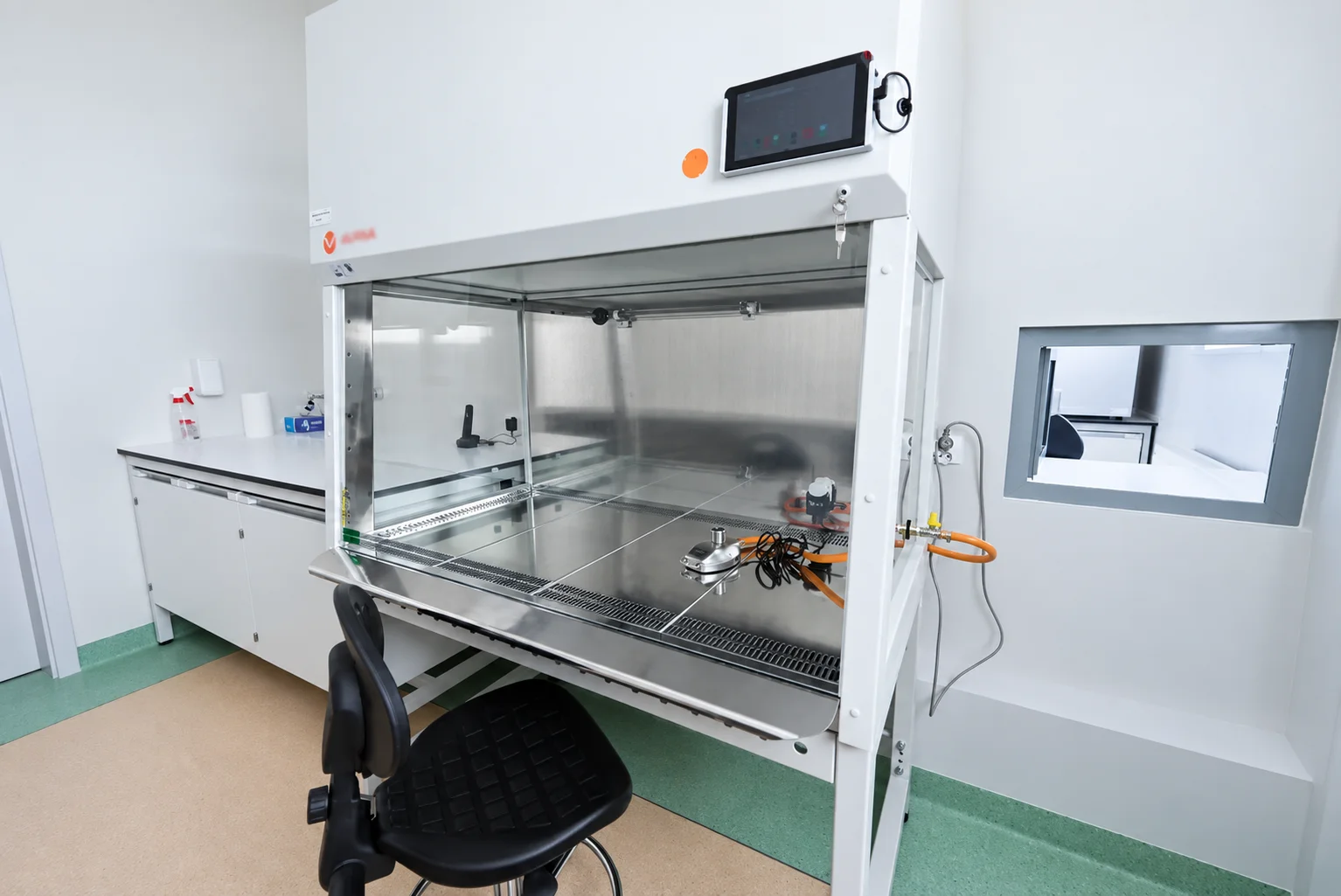 Sanitary and Epidemiological Station in Radom: laboratory cabinet with a stainless steel interior and a chair