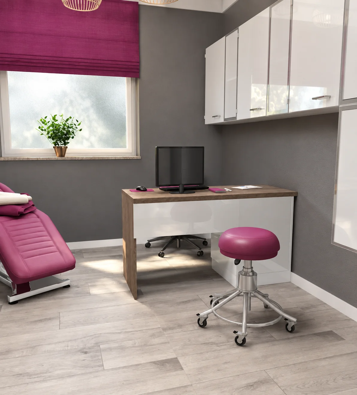 Treatment room with a fuchsia treatment chair, desk, stool and wall cabinets